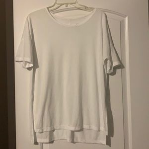 Nike Yoga White Tee hi low style